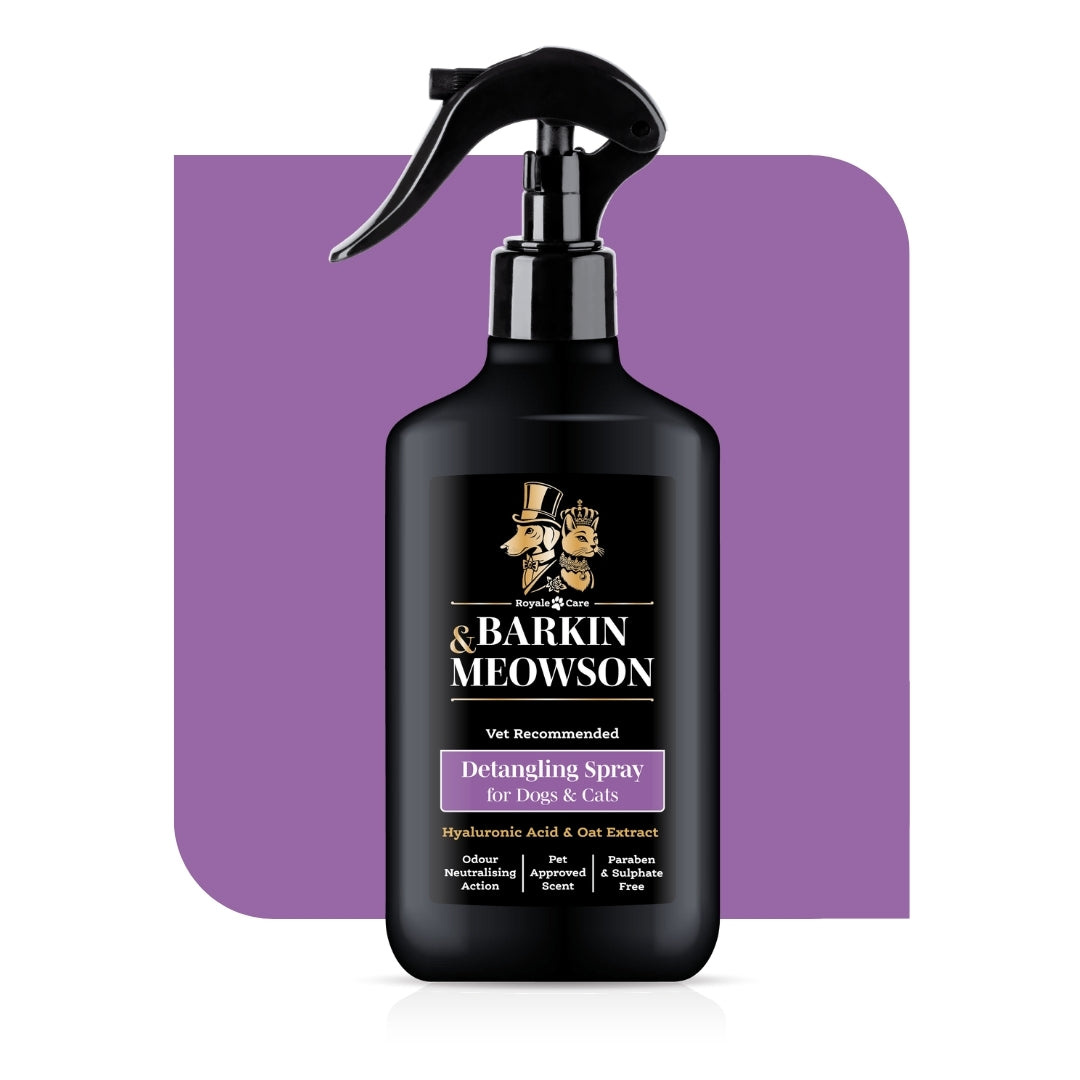 Black bottle of Barkin & Meawson detangling spray for pets on a purple background