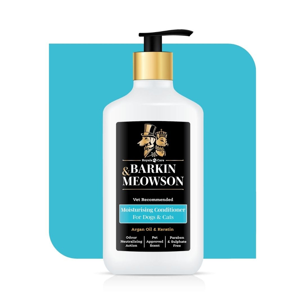 Barkin Meowson pet conditioner bottle on a blue background