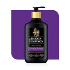 Barkin Meowson detangling shampoo bottle with gold pump on a purple background