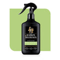 Black spray bottle labeled 'Barkin & Meowson' on a green background