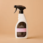 Spray bottle labeled 'Urine Destroyer' on a beige background