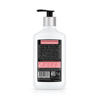 White shampoo bottle with pump and label on a white background