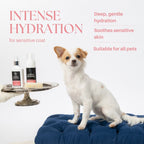 Dog sitting on a blue cushion with pet care products and text about intense hydration for sensitive coat.