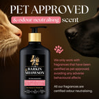 Barkin & Meowson pet shampoo bottle with a cat and dog sniffing it, on a brown background.