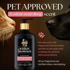 Barkin & Meowson pet shampoo bottle with a cat and dog sniffing it, on a brown background.