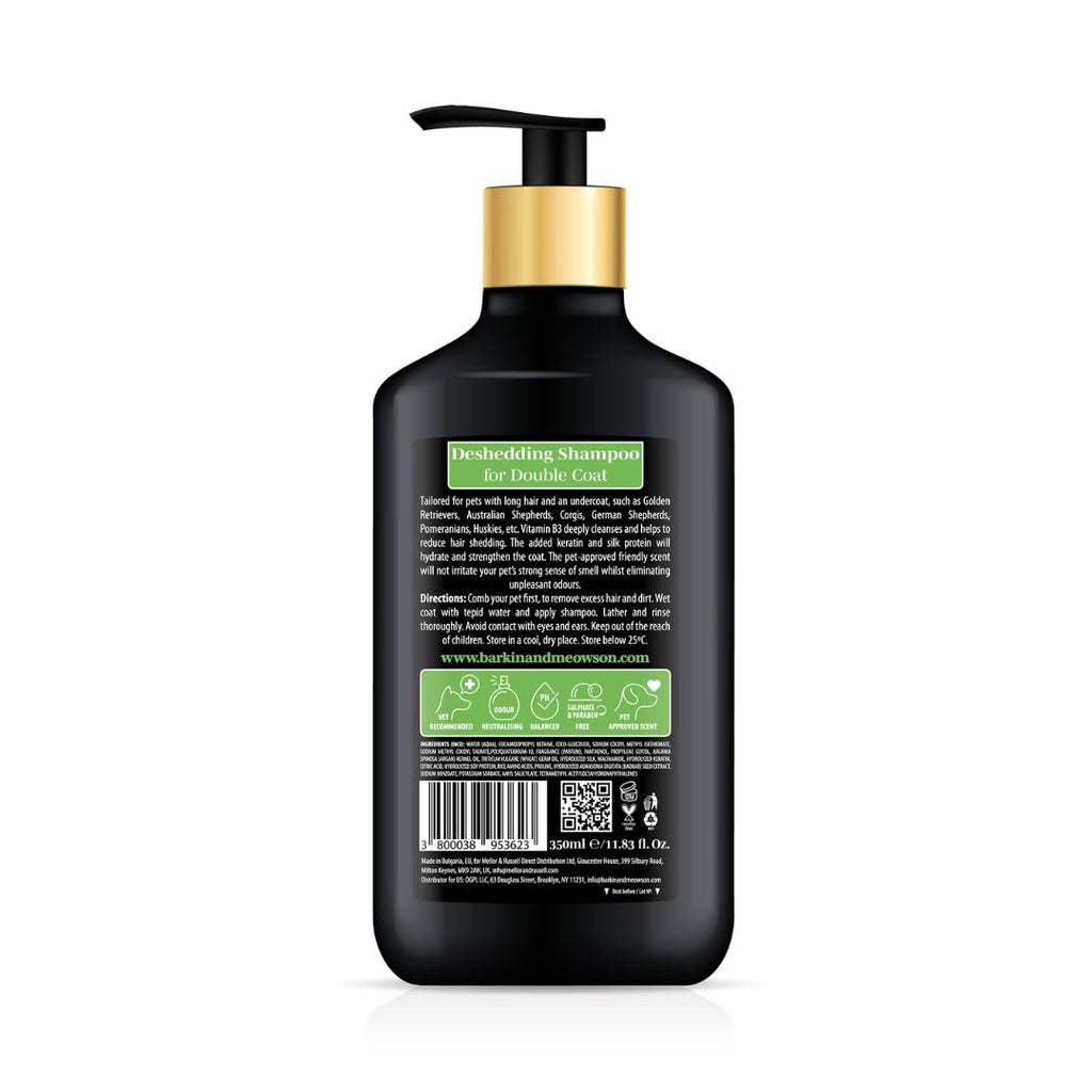 Black shampoo bottle with pump on a white background