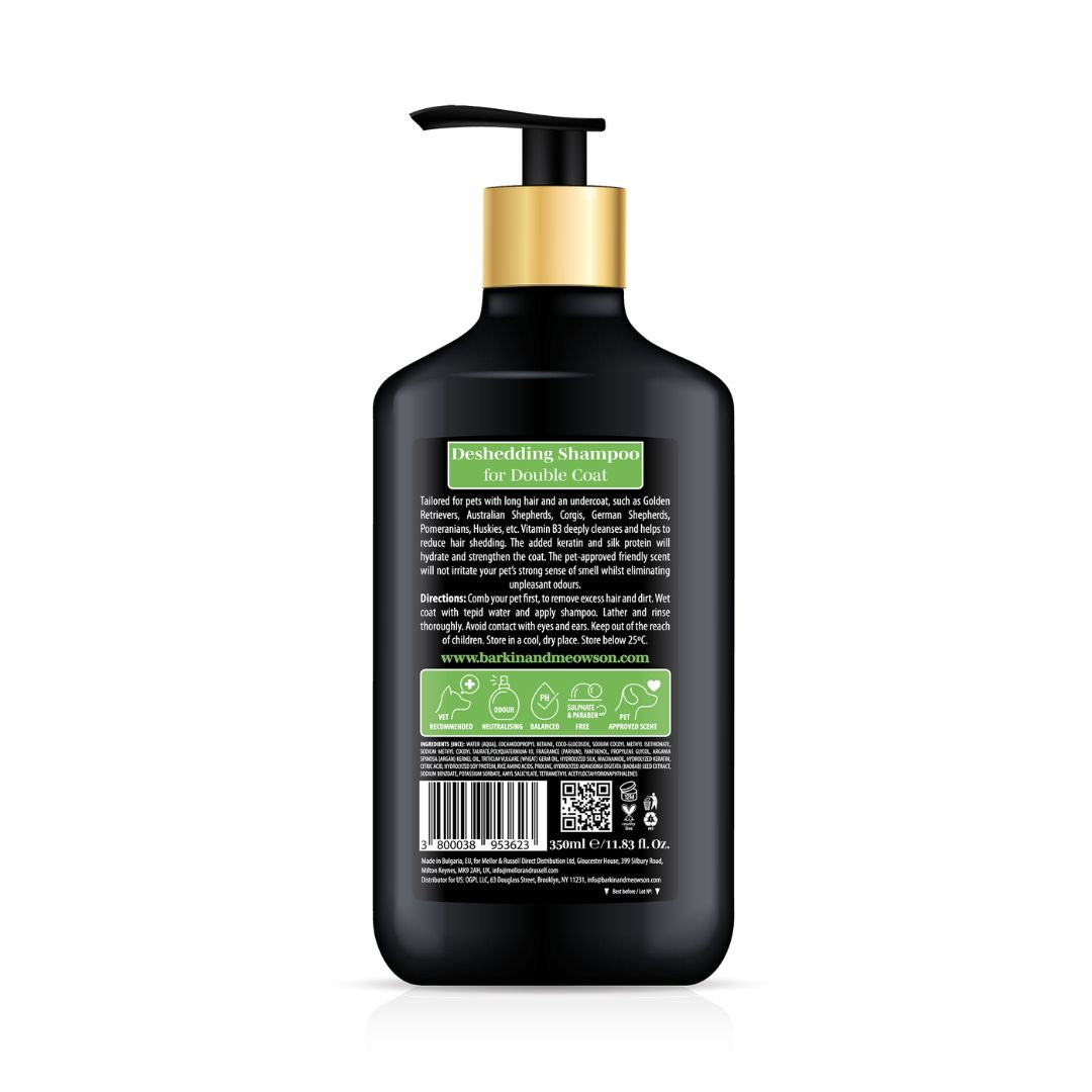 Black shampoo bottle with pump on a white background